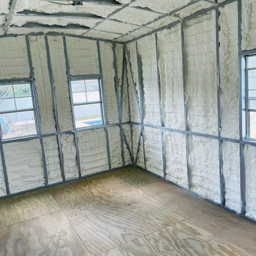 Closed-cell spray foam insulation applied to wall cavities in a residential project in Mocksville